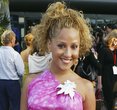 Adrienne Bailon's Stunning Transformation: From Cheetah Girl to Glamorous Icon