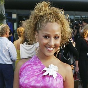 Adrienne Bailon's Stunning Transformation: From Cheetah Girl to Glamorous Icon