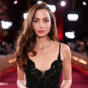 Ana de Armas Embraces Winter Wonderland with Furry Friends and Glamorous Red Carpet Looks