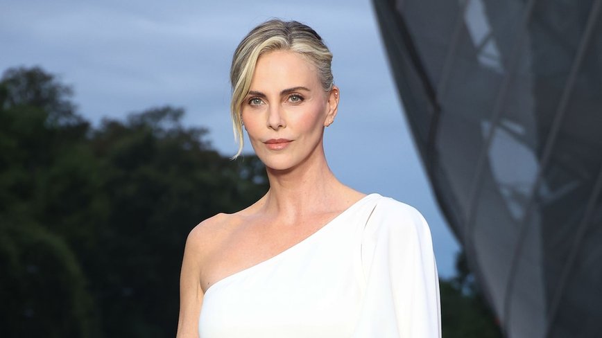 Charlize Theron Wows in Lacy Catsuit Tribute to Jerry Hall