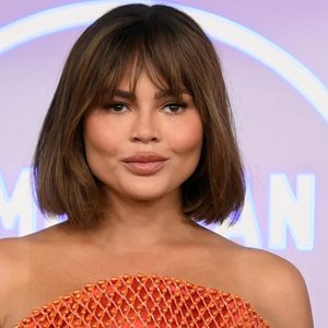 Chrissy Teigen's Heartfelt Farewell: Losing Her Dad Ron Teigen