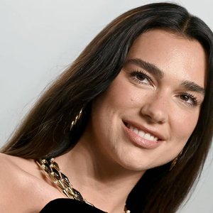 Dua Lipa Dazzles in Sparkly Bikinis and Glamorous Gowns