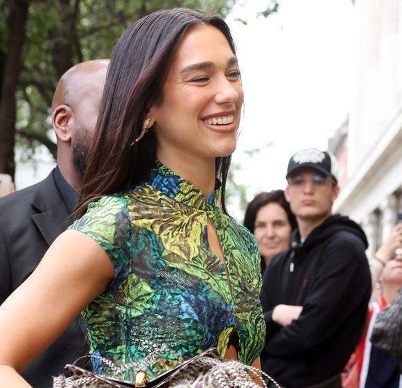 Dua Lipa Stuns in Vintage Kim Shui Dress at London Pop-Up Extravaganza