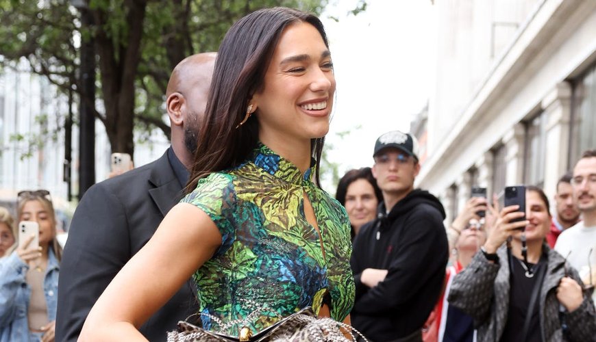 Dua Lipa Stuns in Vintage Kim Shui Dress at London Pop-Up Extravaganza