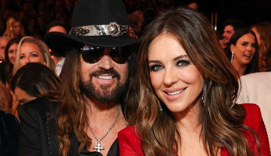 Elizabeth Hurley Turns Heads in a Sheer Minidress While Cozying Up with Billy Ray Cyrus