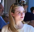 Elle Fanning Blooms in a Butter-Yellow Daisy Ensemble for Spring
