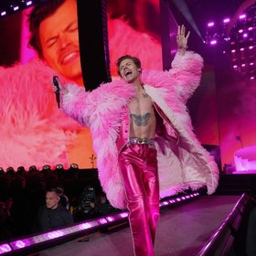 Harry Styles Stuns in Red Shorts for 'Dance No More' Music Video