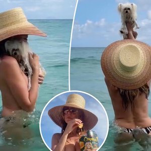 Heidi Klum Sizzles on the Beach with a Snack and Sans Bikini Top!