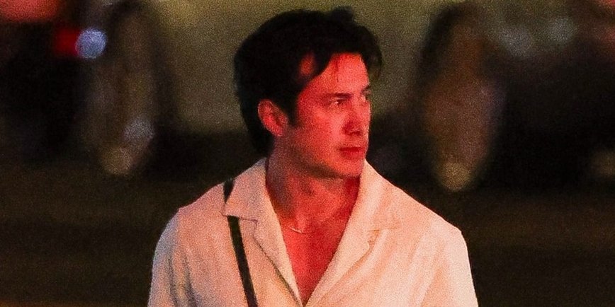 Hudson Williams Turns Heads in a Plunging Linen Top and Trendy Dad Sneakers