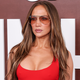 Jennifer Lopez Ignites a Red-Hot Fashion Trend with Her Stunning LRD
