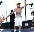 Justin Bieber Steals the Show at Fanatics Fest with a Shirtless Surprise