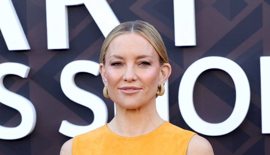 Kate Hudson Steals the Spotlight in Daring Orange Gown at Star-Studded Premiere