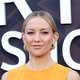 Kate Hudson Steals the Spotlight in Daring Orange Gown at Star-Studded Premiere