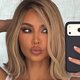 Kim Kardashian Steals the Spotlight with Daring Tank Top in Latest SKIMS Sneak Peek