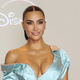 Kim Kardashian's Thigh-High Slit Dress Turns Heads – A Must-See Fashion Moment