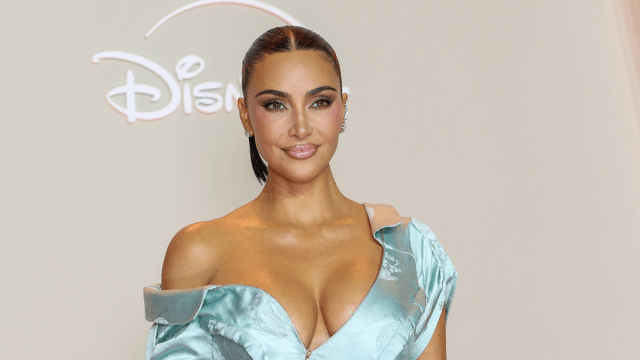 Kim Kardashian's Thigh-High Slit Dress Turns Heads – A Must-See Fashion Moment