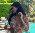 Kylie Jenner's Easter Glam: Vintage Dior, Rolled Jeans, and a Dazzling Belly Chain
