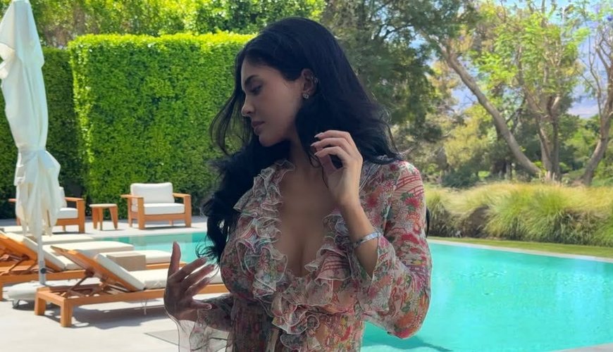 Kylie Jenner's Easter Glam: Vintage Dior, Rolled Jeans, and a Dazzling Belly Chain
