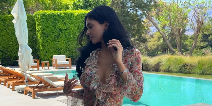 Kylie Jenner's Easter Glam: Vintage Dior, Rolled Jeans, and a Dazzling Belly Chain