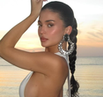 Kylie Jenner's Tank Top Transformation: From Knicks Games to Beach Glam