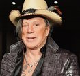 Mickey Rourke's Bold New Look: A Fiery Comeback After Eviction Drama