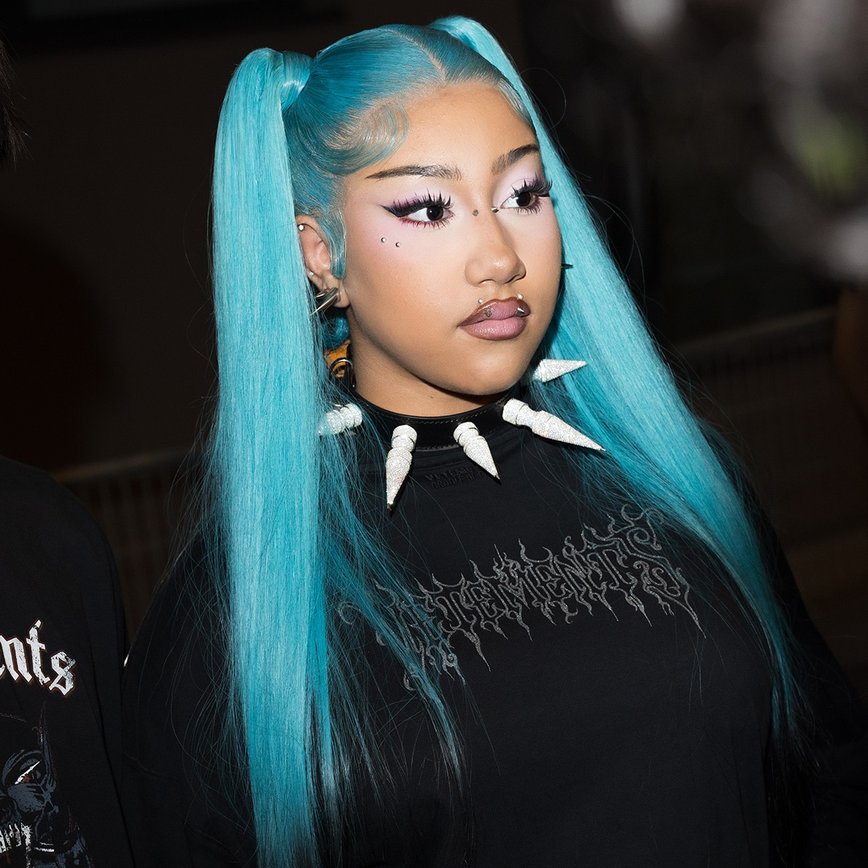 North West Rocks Paris Fashion Week with Dazzling Lip Piercings