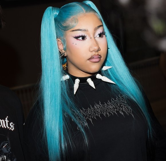 North West Rocks Paris Fashion Week with Dazzling Lip Piercings
