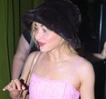 Sabrina Carpenter's Parisian Style Game: Logomania and Vintage Dior Heels