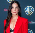 Sandra Bullock Stuns in Leather Bra at Rare Red-Carpet Comeback