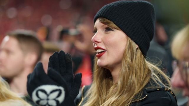 Taylor Swift Steals the Spotlight at Travis Kelce's Game in Oversized Mini Dress