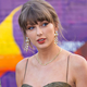 Taylor Swift Dazzles in Mermaid-Inspired Dress at Greek Wedding