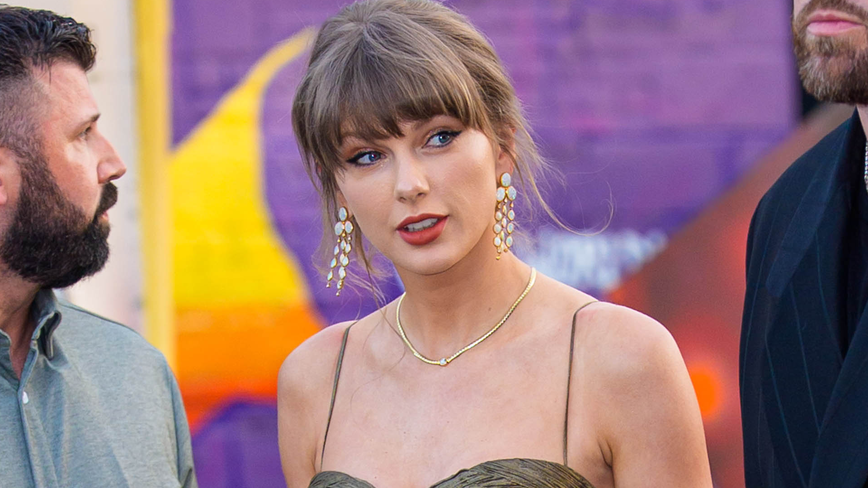 Taylor Swift Dazzles in Mermaid-Inspired Dress at Greek Wedding