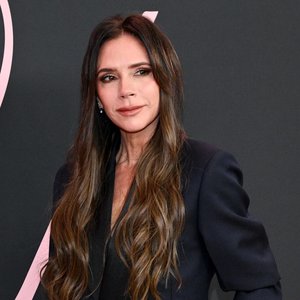 Victoria Beckham Stuns in Plunging Gown as She Brushes Off Brooklyn Drama
