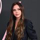 Victoria Beckham Stuns in Plunging Gown as She Brushes Off Brooklyn Drama