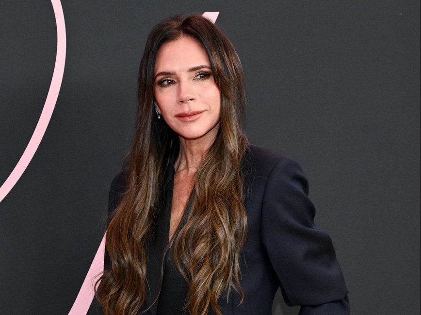 Victoria Beckham Stuns in Plunging Gown as She Brushes Off Brooklyn Drama